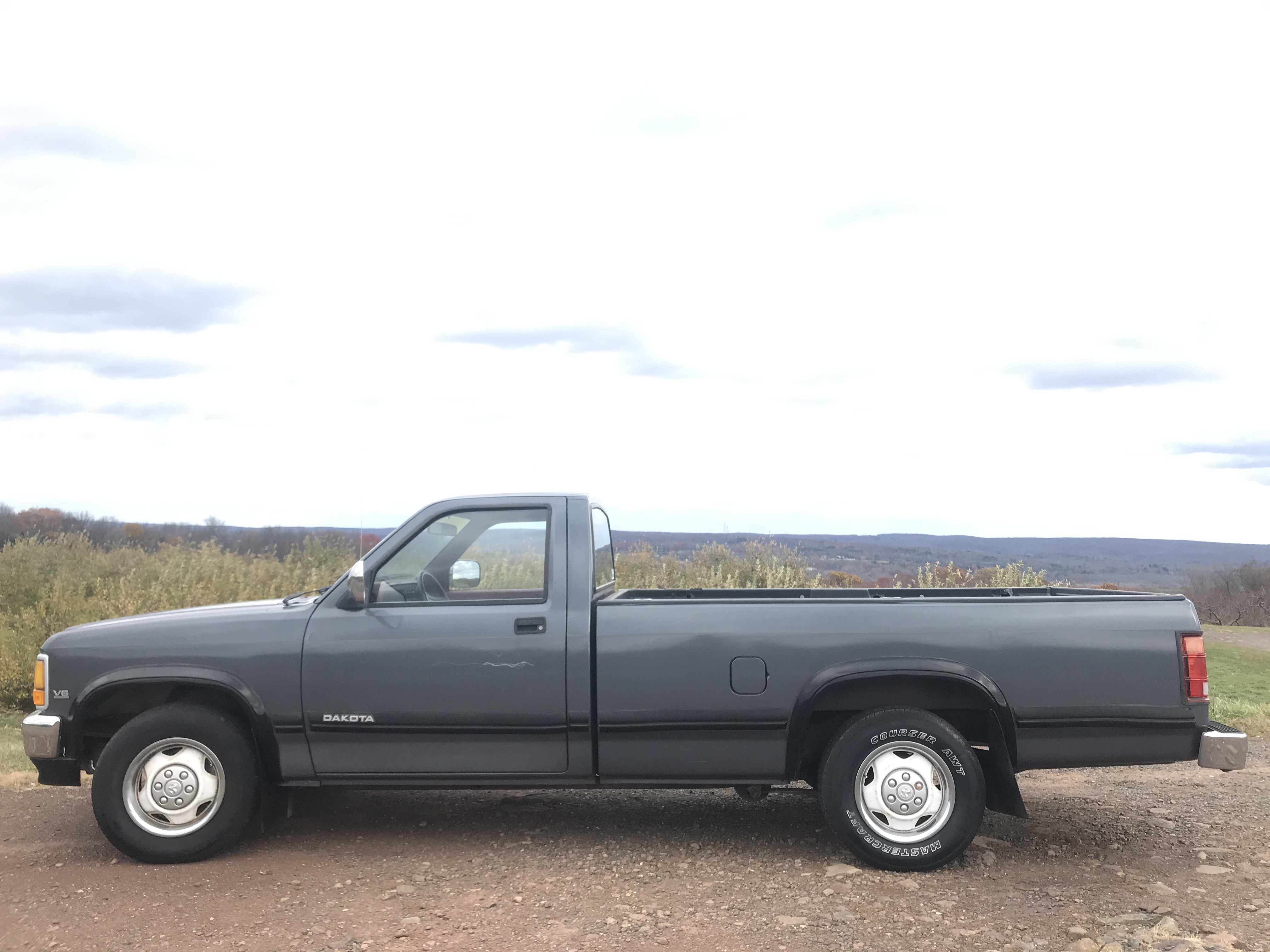 1991 Dodge Dakota Pickup ONE OWNER 117K 8 foot bed and roomy bench seating NICE hero